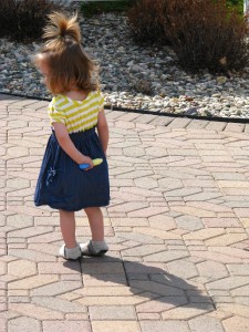 Daughter with sidewalk chalk