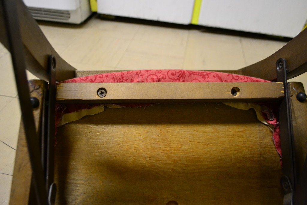 unscrew the seat from the chair at the bottom